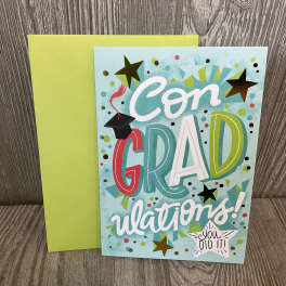 Graduation congratulations card with a lime green envelope