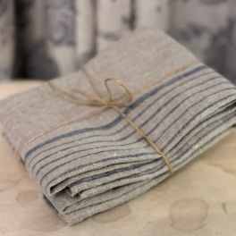 Folded striped cloth tied with twine on a table