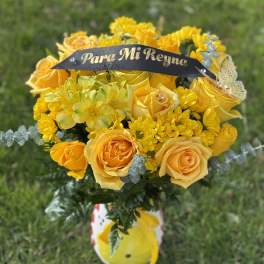 Yellow rose bouquet with mixed yellow flowers and a name banner