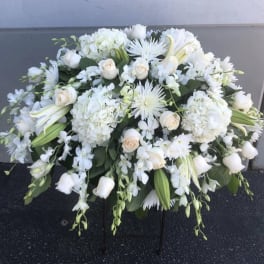 All white floral casket