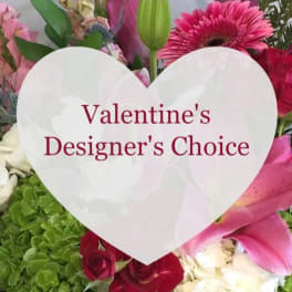 Heart-shaped Valentine's Designer's Choice sign over a mixed flower bouquet