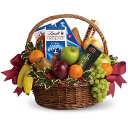 Fruit basket with chocolates and a burgundy ribbon