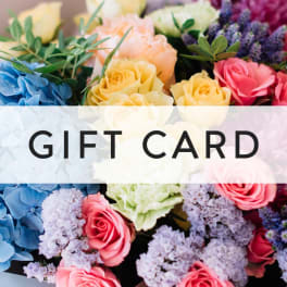 Gift card over a colorful bouquet of roses and hydrangeas