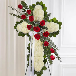 Cross-shaped floral standing spray with red roses and white chrysanthemums