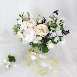 White and cream bridal bouquet with ribbon streamers