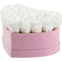 Box of white roses in a pink hatbox