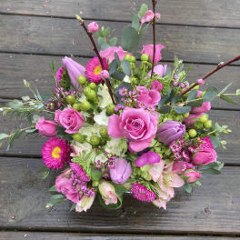 Pink and lavender bouquet with roses and mixed blooms