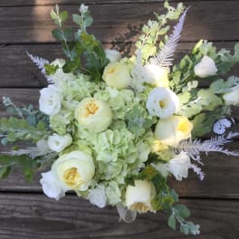 White and pale yellow bouquet with hydrangeas and roses