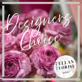 Close-up of layered pink flowers with Designers Choice text overlay