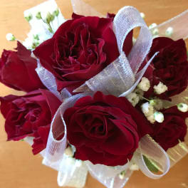 Bouquet of red roses with white baby's breath and silver ribbon