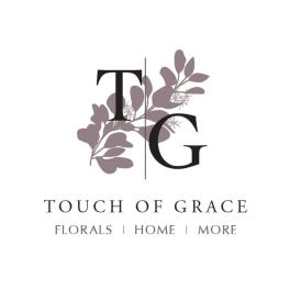 Floral shop logo with stylized T and G letters and leafy branch graphic