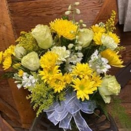Yellow and white bouquet with a sheer ribbon bow