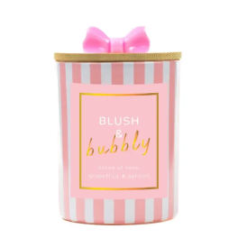 Pink striped candle jar with a bow-shaped lid