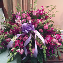 Large pink and purple floral spray with lavender ribbons