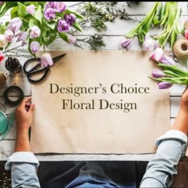 Designer’s Choice Floral Design sign surrounded by tulips and tools