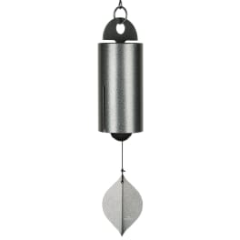 Black metal wind chime with a leaf-shaped pendant