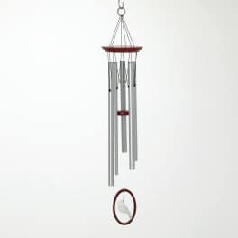 Silver wind chime with red accents and a bird ornament