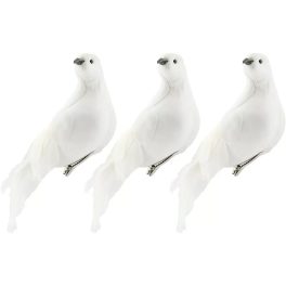 Three white decorative bird clips on a white background