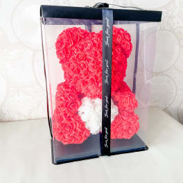 Heart-shaped red rose gift box with a white rose accent