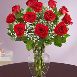 Bouquet of red roses in a clear glass vase