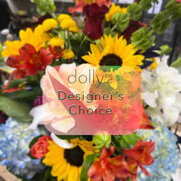 Mixed bouquet with sunflowers, roses, and lilies in bright colors