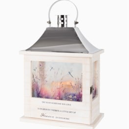 White memorial lantern with a printed floral scene and quote