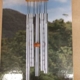 Silver wind chime with hanging metal tubes