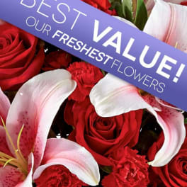 Red roses and pink lilies with a purple banner reading "BEST VALUE"