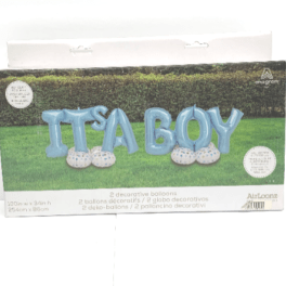 Blue 'It’s a Boy' letter balloons on white dotted bases on a lawn backdrop