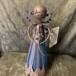 Decorative metal angel figurine with blue accents and jeweled wings