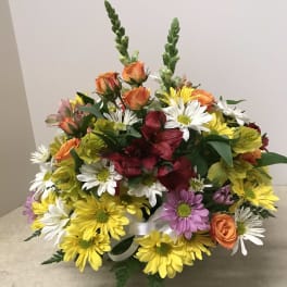 Colorful mixed bouquet with daisies, roses, and alstroemeria