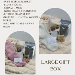 Gift box with blanket, socks, mug, tea, honey, soap, and infuser