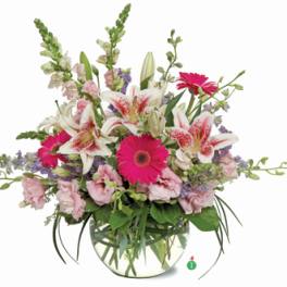 Pink and white mixed bouquet in a clear glass vase