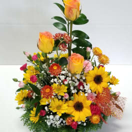“Brighten Up Your Day!” Arrangement *If sunflowers are unavailable it will be substituted with more spring flowers.