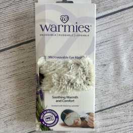 Packaged microwavable eye mask with faux fur cover