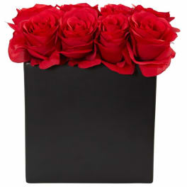 Red roses arranged in a black square box