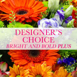 Bright mixed bouquet with orange gerbera daisies and purple-white blooms
