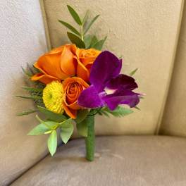 Small bouquet of orange roses, a yellow mum, and a purple orchid