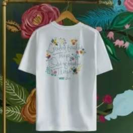 White T-shirt on a hanger with floral graphic text