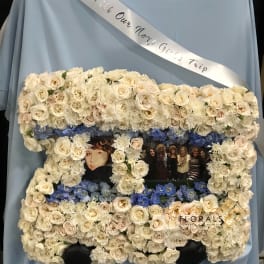 Floral photo frame with white roses and blue flowers around two pictures