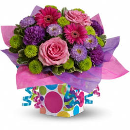 Pink and purple mixed bouquet in a polka-dot gift box