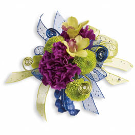 Purple and yellow floral corsage with blue ribbon accents