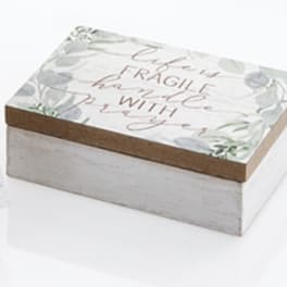Decorative gift box with a floral lid and cursive text