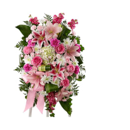 Pink and white floral standing spray with lilies and roses