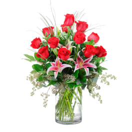 Showy mix of oriental lilies and roses