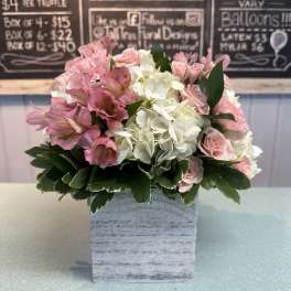 Pink and white bouquet in a gray wooden box