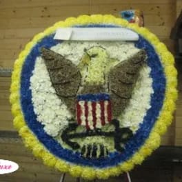 Circular floral tribute with an eagle and American flag design