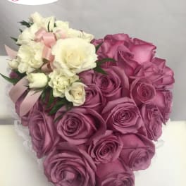 Pink and white rose bouquet with a satin ribbon