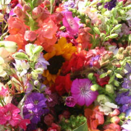 Mixed bouquet with a sunflower and colorful blossoms