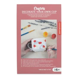Craft kit box for decorating a cup with paint and brushes